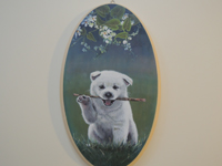 ペットロスの方がペットのリアルな似顔絵の注文（オーダー）前に見る作品～枝を咥えた元気な仔犬を立体感を出して描いた肖像画のグッズ